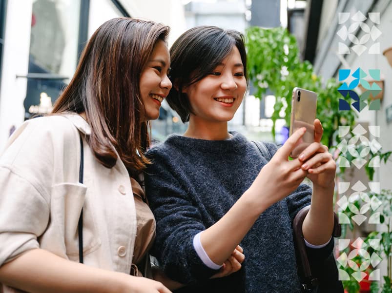 two people looking at phone