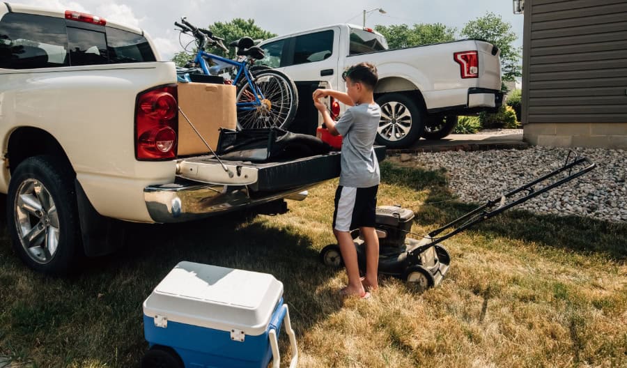 child putting something together at a truck bed